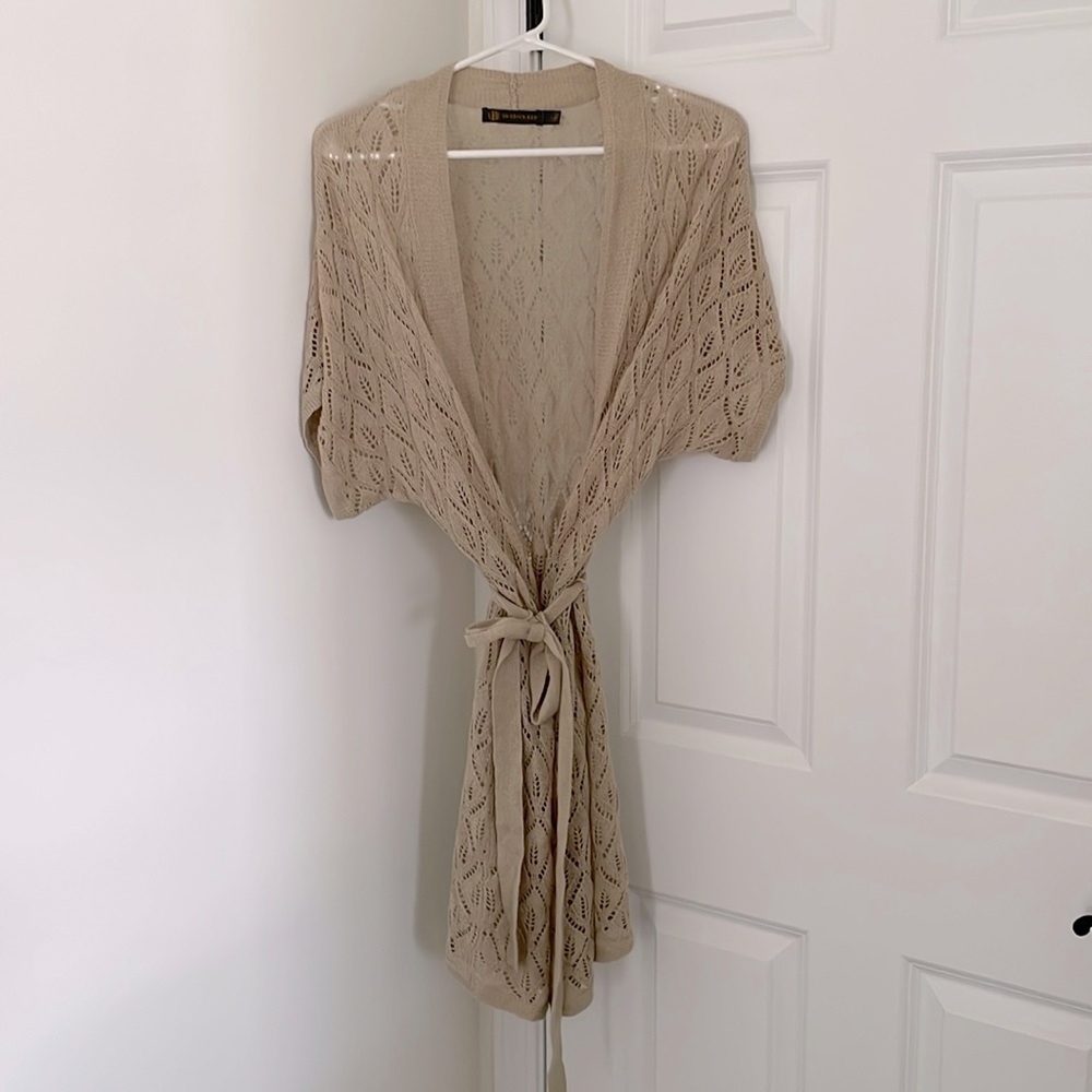 Beige throw over